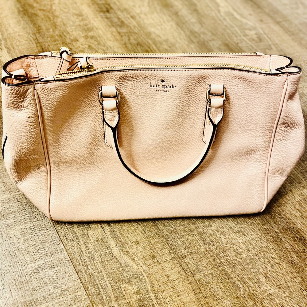 This is my light pink Kate spade purse.